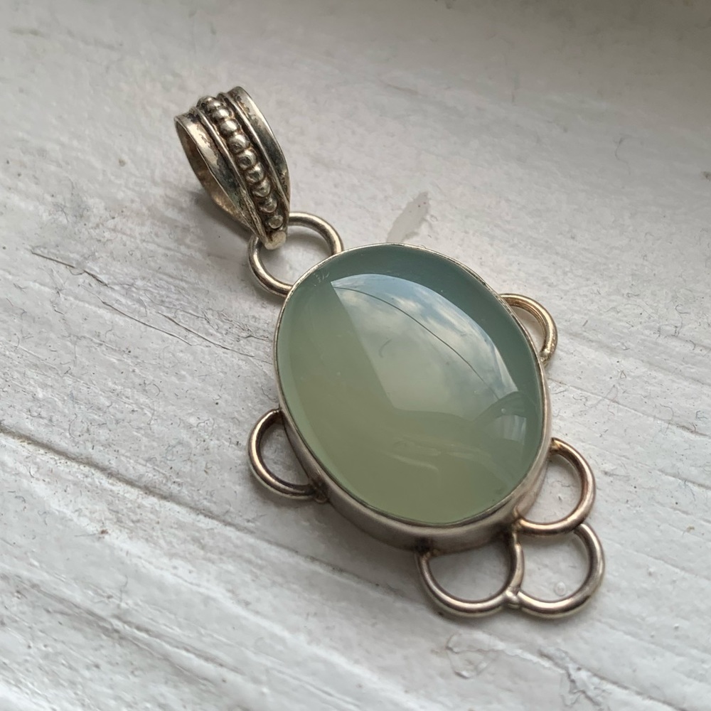 Green and “silver” gemstone pendant
